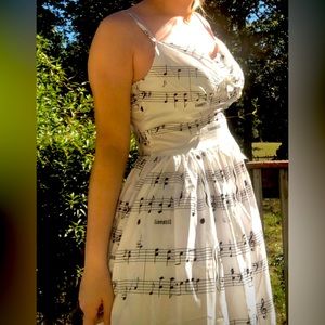 Music print knee high dress
